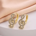 Elegant gold musical note hoop earrings with sparkling cubic zirconia on pink silk - G-clef Music Note
