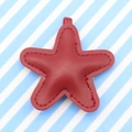 Red star leather pendant with detailed stitching and a small hanging ring attachment - Wine Red