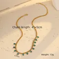 Detail of gold chain necklace with twelve green-blue water drop rhinestones and extension - Water Drop / Green