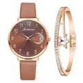 Detail of a brown leather watch with moon-star dial and matching crystal star bracelet - Watch and Bracelet Set / Brown