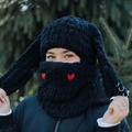 Black knitted rabbit ear balaclava hat with silver rings and red heart embroidery details - Black