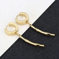 Detail of gold-plated stainless steel hoop earrings featuring minimalist bamboo pendants - Bamboo - Gold