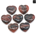 Red and black striped natural crystal heart stones in a 7-piece decorative set - Sesame Stone