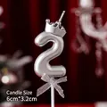 Silver number 2 birthday candle with crown detail and glitter ribbon on plastic stand - Number Candle Silver Crown Bow 2