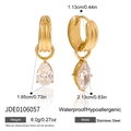Macro detail of 18K gold stainless steel teardrop earrings with zircon stones and specs - Gold Pear Zirconia Drop Earrings (JDE0106057)