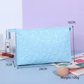 Sky blue Y2K heart embossed makeup bag with glossy finish and top zipper handle - Business Organizer Bag / Blue
