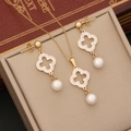 Detail of clover jewelry set with rhinestones and pearls in a vintage gift box - Gold Four-Leaf Clover Style (No. 6 Flower)