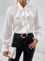Close-up of white satin blouse featuring layered ruffle collar and elastic cuffs details - S / White