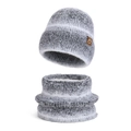 Grey and white knitted winter hat and neck warmer set with a brown leather logo tag - Two-Piece Set / Gray