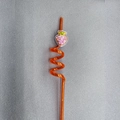 Dettaglio di cannuccia a spirale arancione con decorazione a forma di carota rosa glitter - Carota