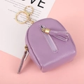 Mini backpack coin purse keychain in purple lychee leather with decorative tassel - Purple