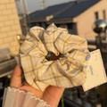 Detail of yellow plaid scrunchie with a purple button accent and soft cotton texture - Yellow White Plaid Scrunchie with Purple Button