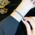 Elegant gold plated bracelet featuring blue and purple oval cut cubic zirconia stones - Silver Purple Zirconia Bracelet (A2115)