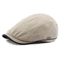 Beige herringbone newsboy cap with black trim and vintage metal side badge - Elastic Band / Beige