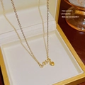 Elegante goldene Titanhalskette mit Herzanhänger in einer Premium-Schmuckschatulle - Herz-Stil (X110) / Gold