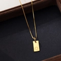 Elegant gold square pendant necklace featuring letter Q engraving on a box chain - Letter Q / Gold