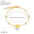 Detail view of 18K gold plated stainless steel bracelet with 18+3cm length and 10mm medallion - Round Embossed Style (SH710G)