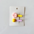 Set of 2 colorful flower and bead hair clips for girls on a white card display - Flower and Bead / Pink Scalloped