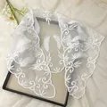 Close-up of white lace floral embroidery on high-quality mesh fabric with feather patterns - Feather Pattern (SJJ04-8)