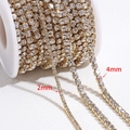 Close-up of 2mm and 4mm gold plated rhinestone claw chains for DIY jewelry making - 4mm 1 Meter/Pack / Gold
