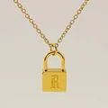 Minimalist gold necklace with a square padlock pendant featuring an engraved letter R - Letter R Style