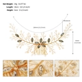 Macro detail of gold bridal hair comb with rhinestone floral patterns and dimensions - Gold