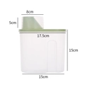 Contenitore trasparente con coperchio verde, misurino integrato e dimensioni dettagliate - Piccolo / Verde Nordico