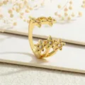 Detail of gold-plated brass ring with five stars featuring sparkling zircon inlay - Star Style (RG0081-A)