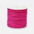 Macro detail of rose red 0.8mm nylon cord spool for manual jewelry braiding and crafts - Color 7 Bright Red