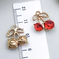 Red rhinestone cherry pendants in gold finish with measurement scale shown - Bow Red Rhinestone Cherry (23398)