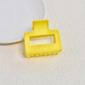 Macro shot of a matte yellow square hair claw clip on a textured white surface - Matte Yellow Small Square Claw Clip (5#)