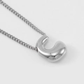 Polished silver bubble letter C pendant on a classic cuban chain necklace - Steel Letter C