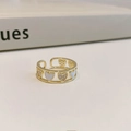 Gold open ring with hollow heart design featuring white enamel and sparkling crystals - Heart Hollow