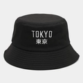 Close-up of white TOKYO embroidery and precise stitching on black cotton bucket hat - M (56-58cm) / Black