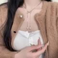 Silver bow necklace with tassel pearls worn by model with white and brown outfit - Bowknot Tassel Artificial Pearl Necklace (X0827)