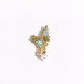Close-up of asymmetric butterfly earring with blue enamel, zircons and pearl drop - Gold Blue-Brown Gradient Enamel Pearl Butterfly Style