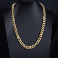 Detail of a gold Cuban link chain with thorn wire accents on a black mannequin - 60CM / Gold Necklace