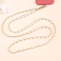 Close-up of golden metal and white leather woven phone crossbody chain with metal clasp - 7mm Leather-wrapped Chain White / 54g