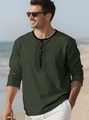 Detail of dark green cotton linen shirt featuring vintage buttons and textured fabric - S / Army Green