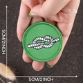 Green circular embroidered scout patch with white knot pattern and 5cm diameter - Green Knot