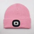 Pink knitted beanie hat featuring a built-in LED light module for outdoor safety - 4-LED Style / Pink