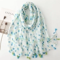 Lightweight white scarf with blue flower print and tassels, shown with travel magazine - Blueberry Print Tassel Style (SL2405-010) / 180*88cm