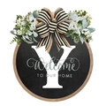 Detail of farmhouse door hanger with black wood base, white letter Y and striped bow - Small / Letter Y