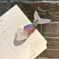 Iridescent mermaid tail hair clip with glitter finish and heart detail on white card - Ice Heart Rhinestone Mermaid Tail / Pink