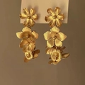Detail of vintage matte gold earrings with three-layer cascading flower petals - 925 Silver Needle Style (42#)