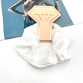 White satin scrunchie on a pink diamond card for weddings and elegant fashion hairstyles - White
