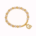 Elegant beaded bracelet with white pearls, gold beads, and a crystal heart-shaped pendant - Letter G