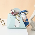 Light blue leather wedding favor bag with decorative nautical silk scarf handle - Teal