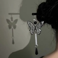 Elegant black hair stick with mesh butterfly and beads worn on a stylish hair bun - Butterfly Tassel Hair Pin