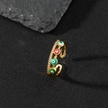 Detail of gold evil eye charms and sparkling cubic zirconia on a double-layer open ring - T-Double Layer Multi-color Eye